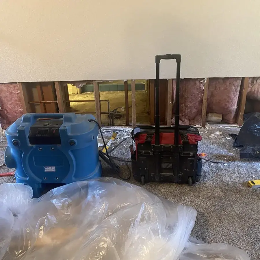 Dehumidifier and equipment drying a flood-cut room in Lodi